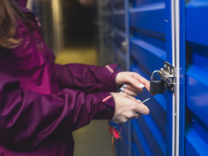 View of self storage warehouse, process of keeping and storing the goods and items in storage units, self-storage building, lock and key concept